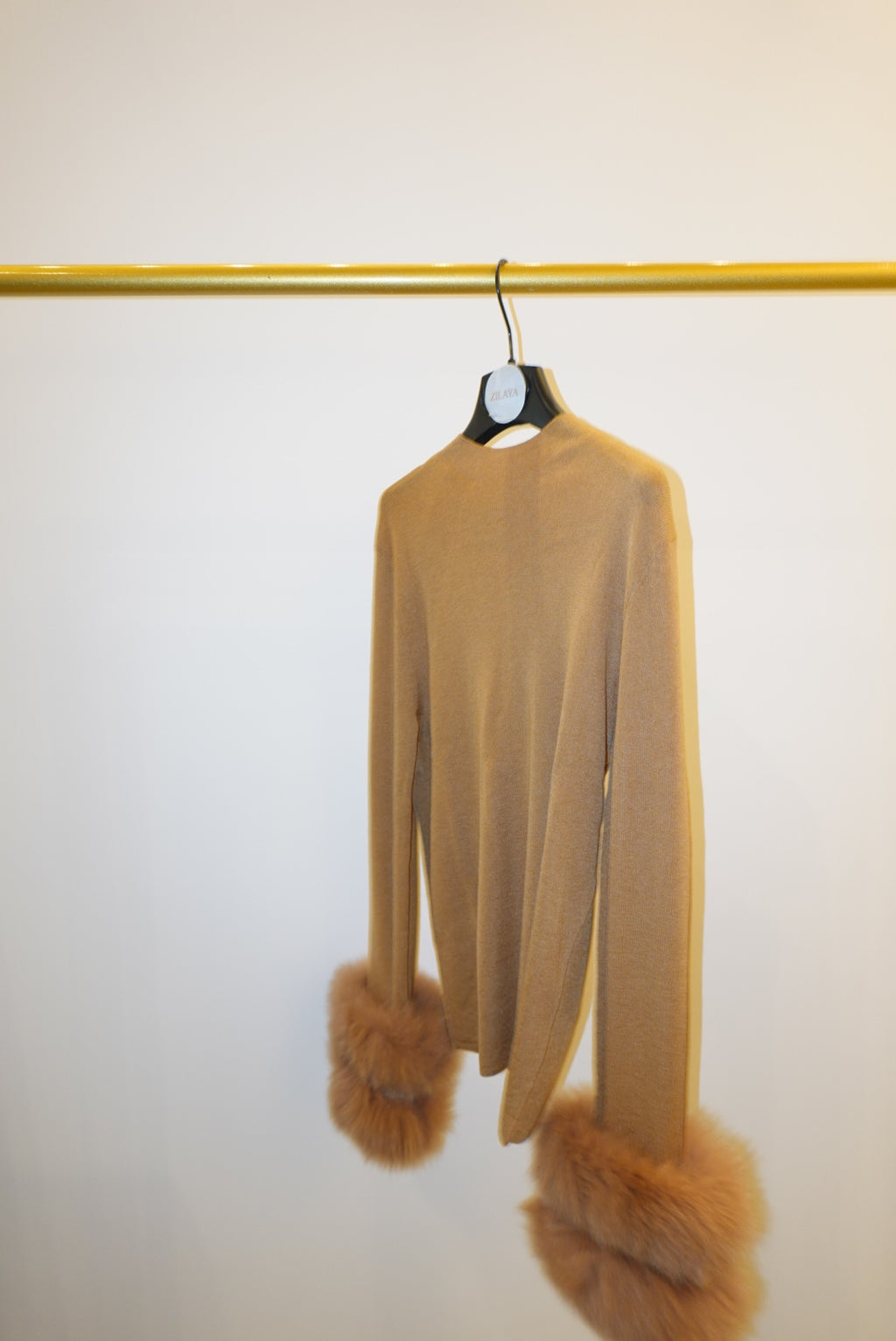 top with detachable fur cuffs