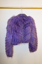 Purple fur jacket on a white background