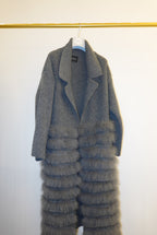 Gray textured coat with fur  on a white background