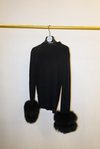 Black top with detachable fur cuffs