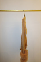 Two tops with detachable fur cuffs