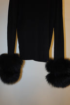 Black top with detachable fur cuffs