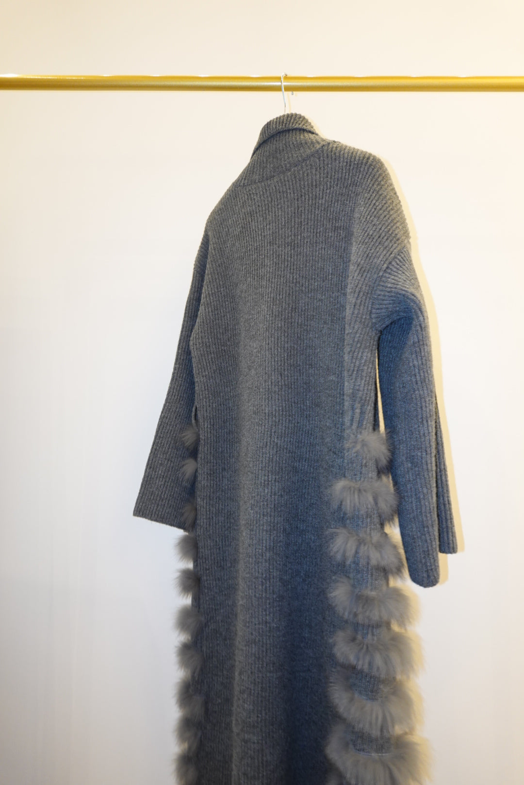 Gray textured coat with fur  on a white background
